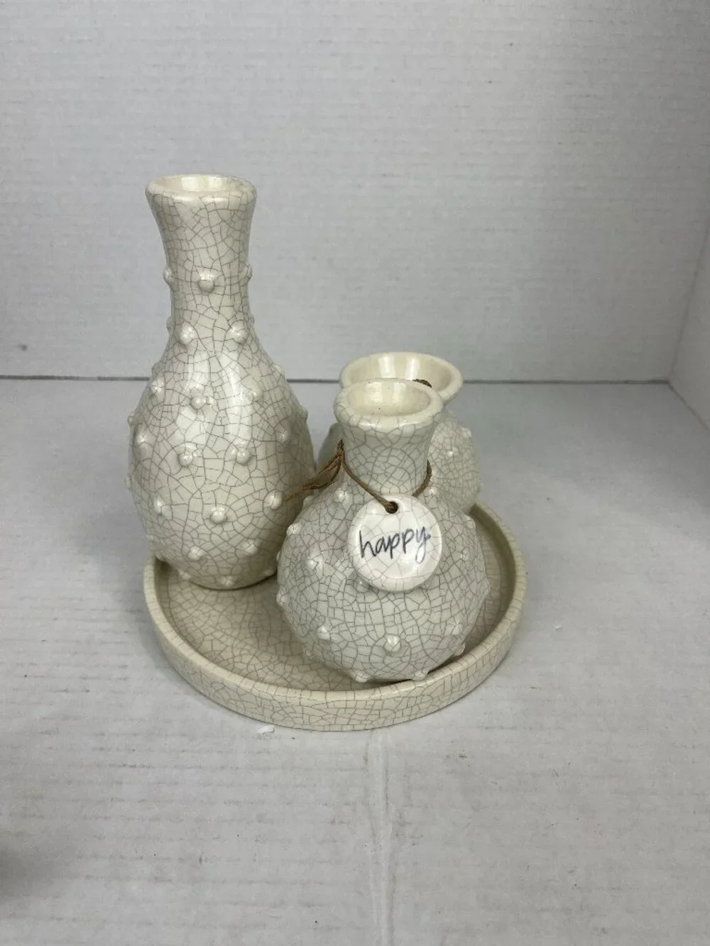 Trio of white ceramic Mudpie Vases permanenetly attached to plate, 7